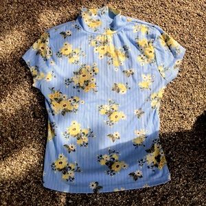 Blue turtleneck shirt with yellow flowers